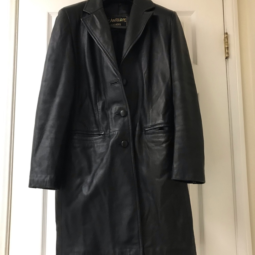 Black leather jacket looks like a rain coat,